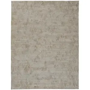 Photo of Gray And Taupe Abstract Hand Woven Area Rug