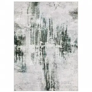 Photo of Gray And White Abstract Printed Stain Resistant Non Skid Area Rug