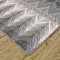 Photo of Gray And White Geometric Stain Resistant Area Rug