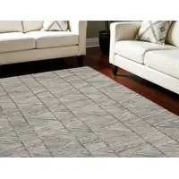 Photo of Gray And White Wool Abstract Area Rug