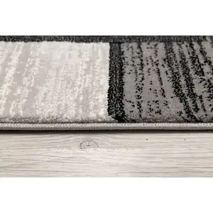 Photo of Gray Asymmetric Blocks Area Rug