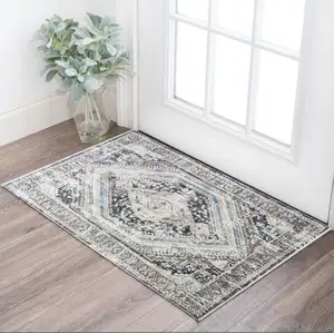 Photo of Gray Beige and Blue Geometric Distressed Area Rug With Fringe