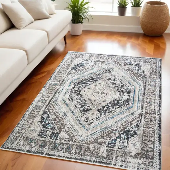 Gray Beige and Blue Geometric Distressed Area Rug With Fringe Photo 1