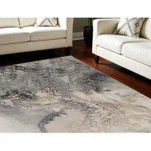 Photo of Gray Beige and Ivory Abstract Area Rug