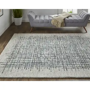 Photo of Gray Black And Tan Wool Plaid Tufted Handmade Stain Resistant Area Rug