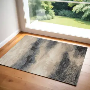 Photo of Gray Black and Beige Abstract Area Rug