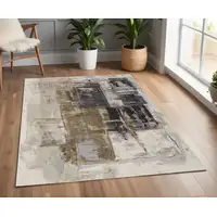 Photo of Gray Black and Brown Abstract Power Loom Area Rug