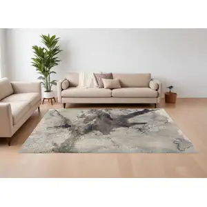 Photo of Gray Black and Brown Abstract Power Loom Area Rug