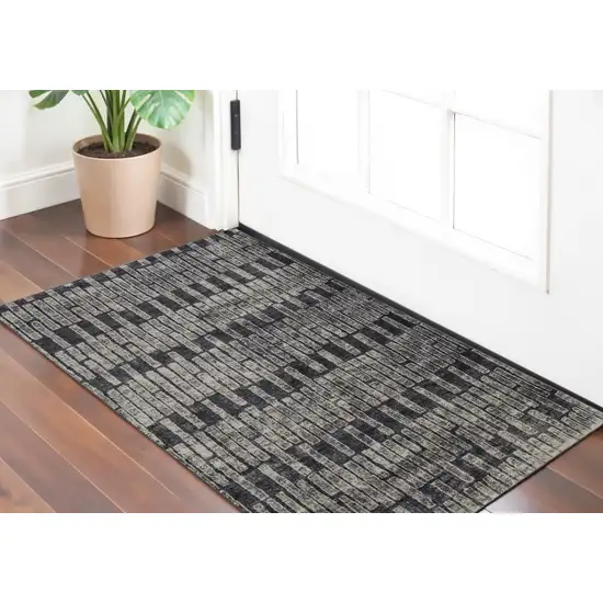 Gray Black and Ivory Geometric Power Loom Worn Faded Area Rug Photo 1