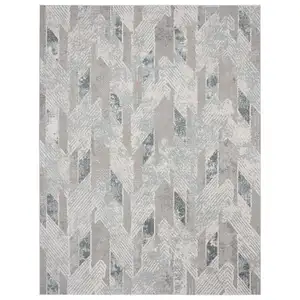 Photo of Gray Blue And Cream Geometric Distressed Stain Resistant Area Rug