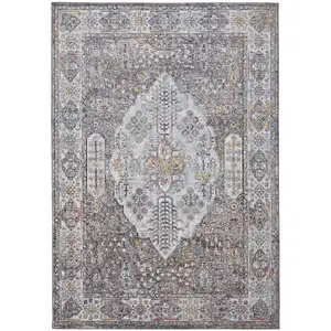 Photo of Gray Blue And Gold Floral Stain Resistant Area Rug