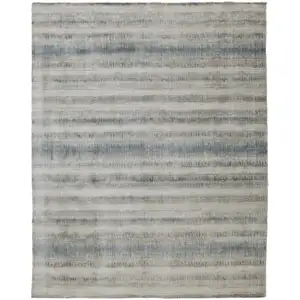 Photo of Gray Blue And Green Abstract Hand Woven Area Rug