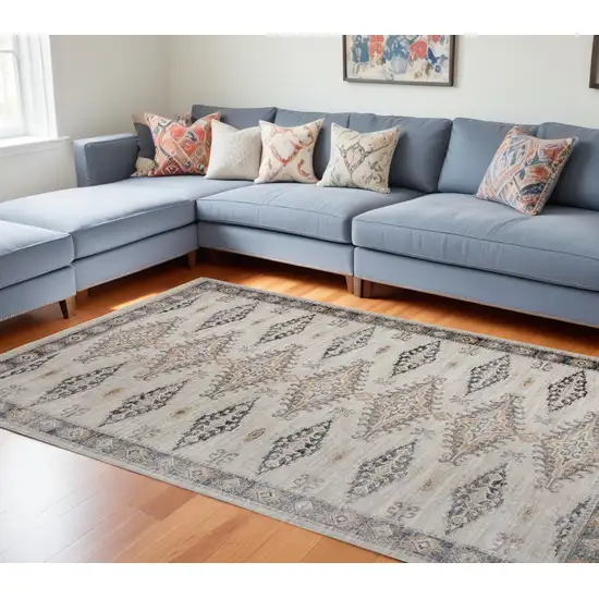 Gray Blue And Orange Floral Stain Resistant Area Rug Photo 1