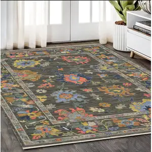 Photo of Gray Blue And Yellow Oriental Area Rug With Fringe