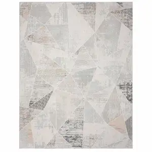 Photo of Gray Blue Taupe And Cream Geometric Distressed Stain Resistant Area Rug