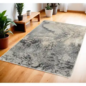 Photo of Gray Blue and Ivory Abstract Area Rug