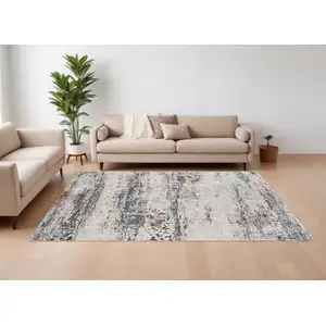 Photo of Gray Blue and Ivory Abstract Power Loom Area Rug