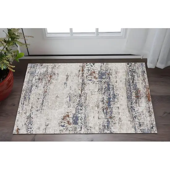 Gray Blue and Ivory Abstract Power Loom Area Rug Photo 1