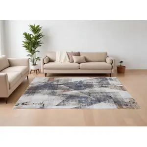 Photo of Gray Blue and Ivory Checkered Power Loom Area Rug