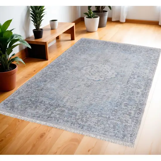 Gray Blue and Ivory Oriental Hand Woven Distressed Area Rug With Fringe Photo 1