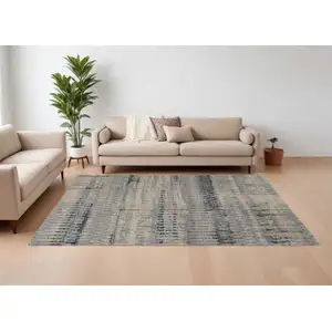 Photo of Gray Blue and Ivory Wool Abstract Hand Knotted Area Rug