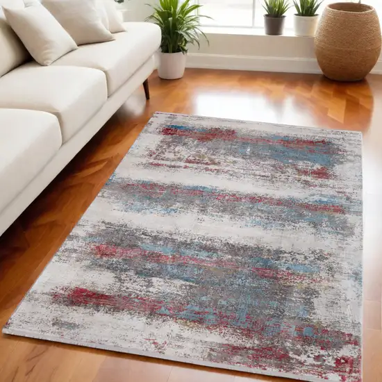 Gray Blue and Red Abstract Power Loom Area Rug With Fringe Photo 1