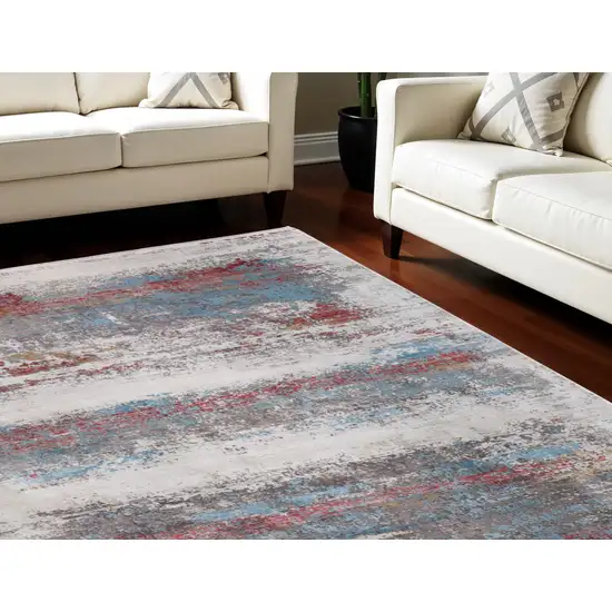 Gray Blue and Red Abstract Power Loom Area Rug With Fringe Photo 1