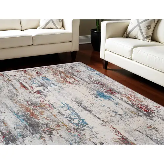 Gray Blue and Red Abstract Power Loom Area Rug With Fringe Photo 1