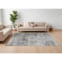 Photo of Gray Blue and Red Abstract Power Loom Worn Faded Area Rug