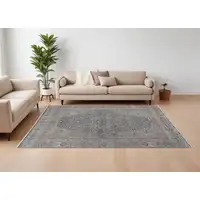 Photo of Gray Blue and Red Oriental Power Loom Worn Faded Area Rug With Fringe