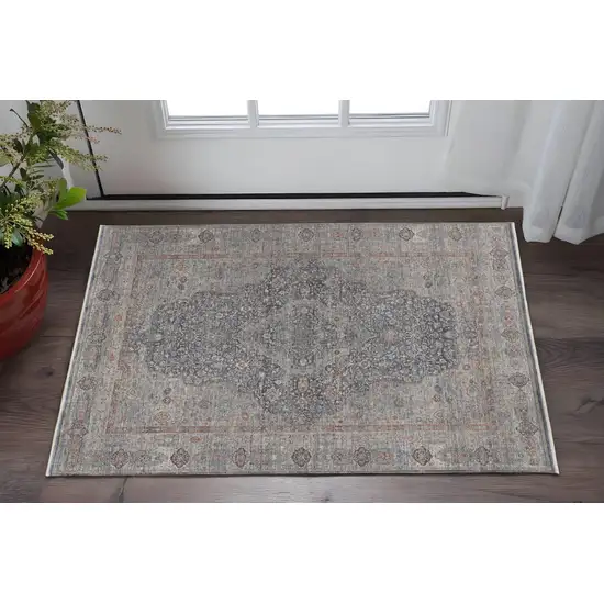 Gray Blue and Red Oriental Power Loom Worn Faded Area Rug With Fringe Photo 1