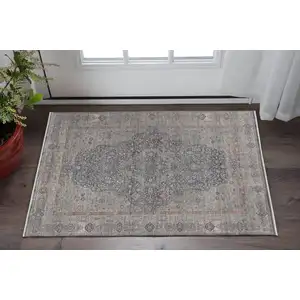 Photo of Gray Blue and Red Oriental Power Loom Worn Faded Area Rug With Fringe