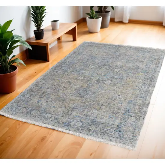 Gray Blue and Tan Abstract Hand Woven Distressed Area Rug With Fringe Photo 1