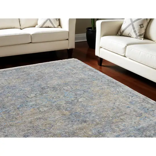 Gray Blue and Tan Abstract Hand Woven Distressed Area Rug With Fringe Photo 1