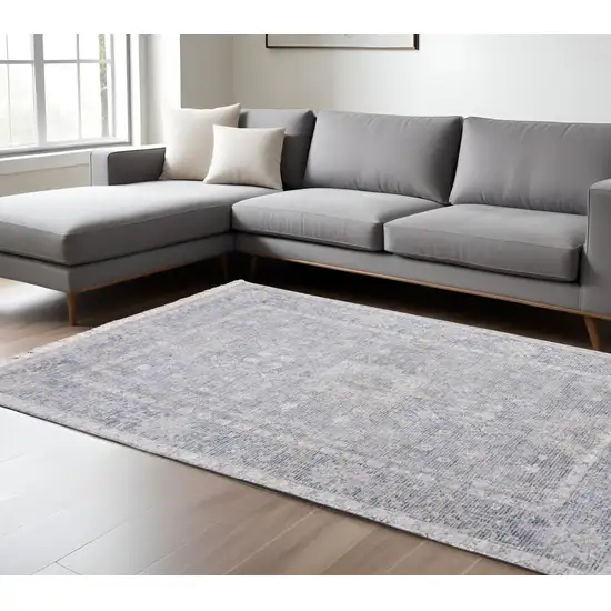 Gray Blue and Taupe Abstract Hand Woven Distressed Area Rug With Fringe Photo 1