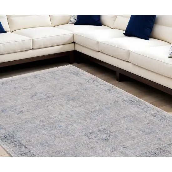 Gray Blue and Taupe Abstract Hand Woven Distressed Area Rug With Fringe Photo 1