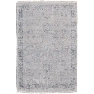 Photo of Gray Blue and Taupe Abstract Hand Woven Distressed Area Rug With Fringe