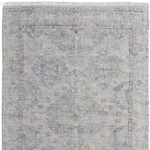 Photo of Gray Blue and Taupe Oriental Hand Woven Distressed Area Rug With Fringe