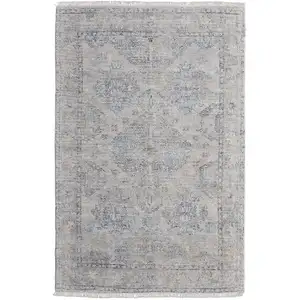 Photo of Gray Blue and Taupe Oriental Hand Woven Distressed Area Rug With Fringe