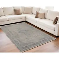 Photo of Gray Blue and Taupe Oriental Power Loom Worn Faded Area Rug With Fringe