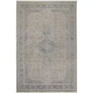 Photo of Gray Blue and Taupe Oriental Power Loom Worn Faded Area Rug With Fringe