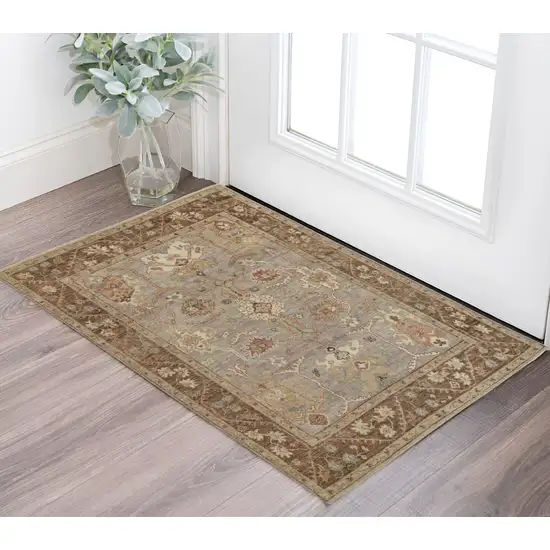 Brown and Ivory Wool Floral Hand Knotted Area Rug With Fringe Photo 1