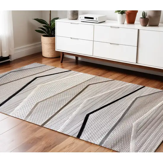 Gray Brown and Beige Abstract Area Rug Photo 1