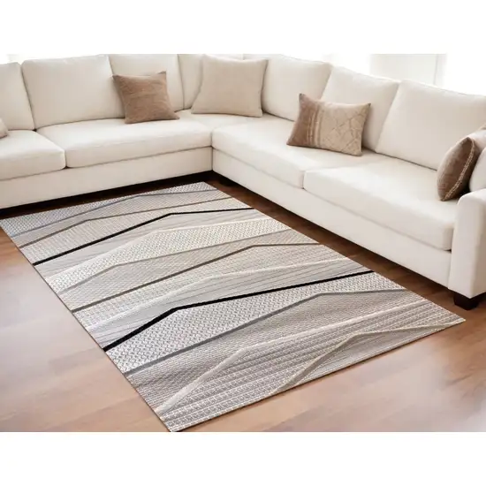 Gray Brown and Beige Abstract Area Rug Photo 1