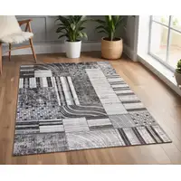 Photo of Gray Brown and Beige Abstract Area Rug