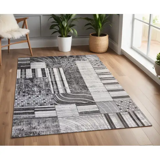 Gray Brown and Beige Abstract Area Rug Photo 1