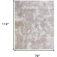 Photo of Gray Brown and Ivory Abstract Power Loom Area Rug