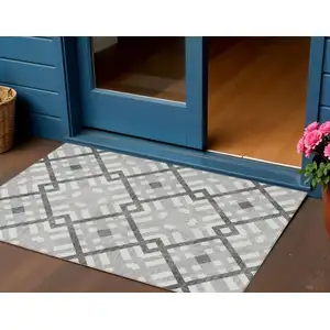 Photo of Gray Charcoal And Ivory Geometric Washable Indoor Outdoor Area Rug