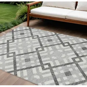 Photo of Gray Charcoal And Ivory Geometric Washable Indoor Outdoor Area Rug