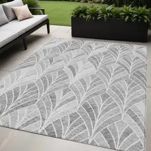 Photo of Gray Charcoal And Ivory Geometric Washable Indoor Outdoor Area Rug